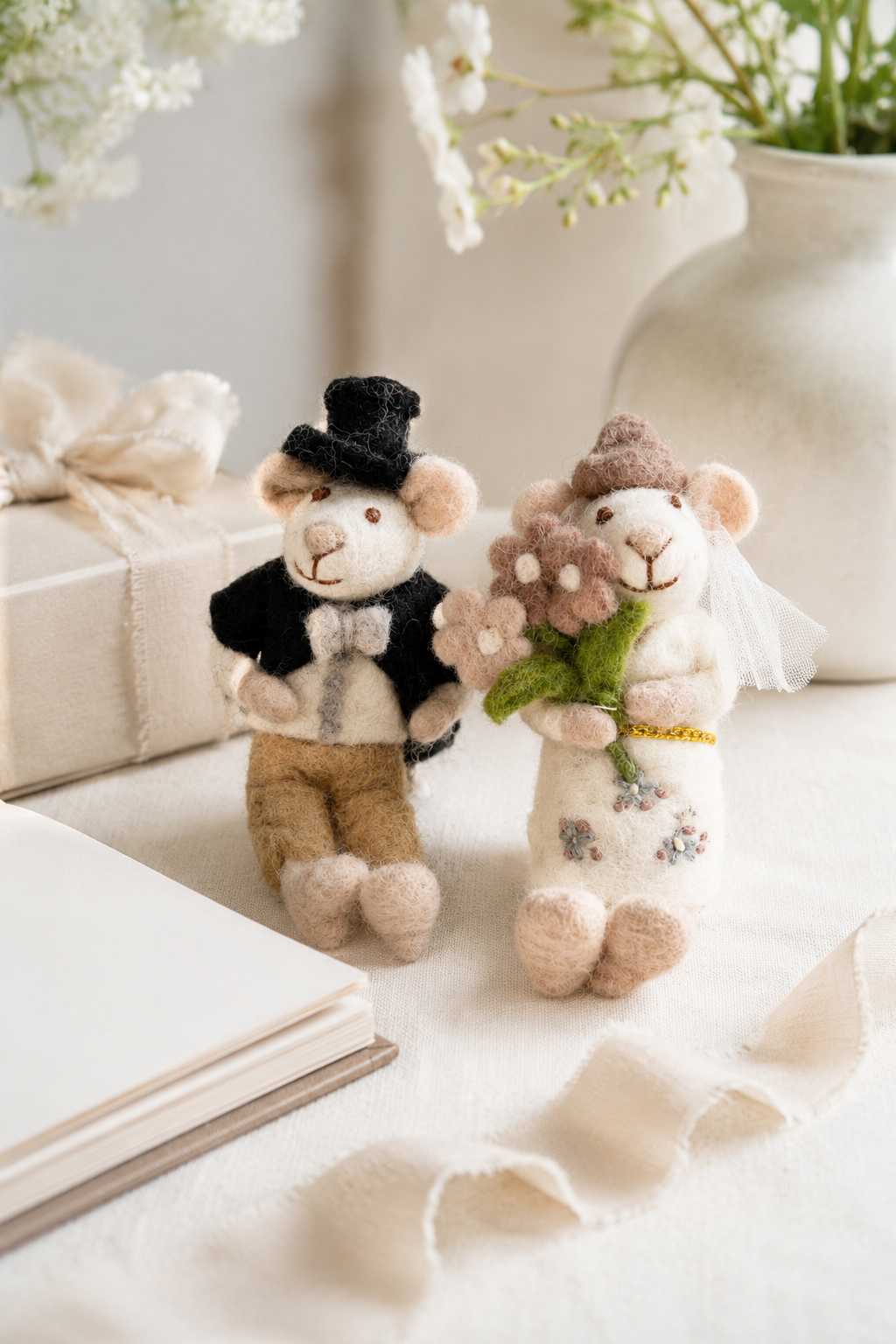 Gry & Sif felt bride and groom mice styled with soft flowers, ribbon, and wedding gift details.