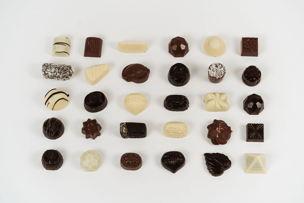 Coffret gourmand présenté pour un cadeau d’entreprise Péché Mignon