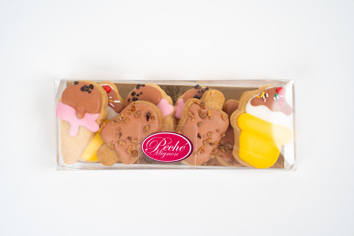 Assorted hand-decorated biscuits in gift box by Péché Mignon with ice cream shapes and chocolate icing
