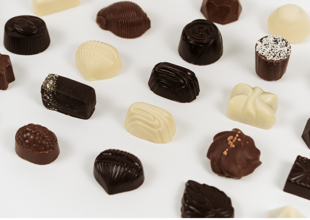 Pralines artisanales belges, chocolat blanc, cholocat au lait et chocolat noir