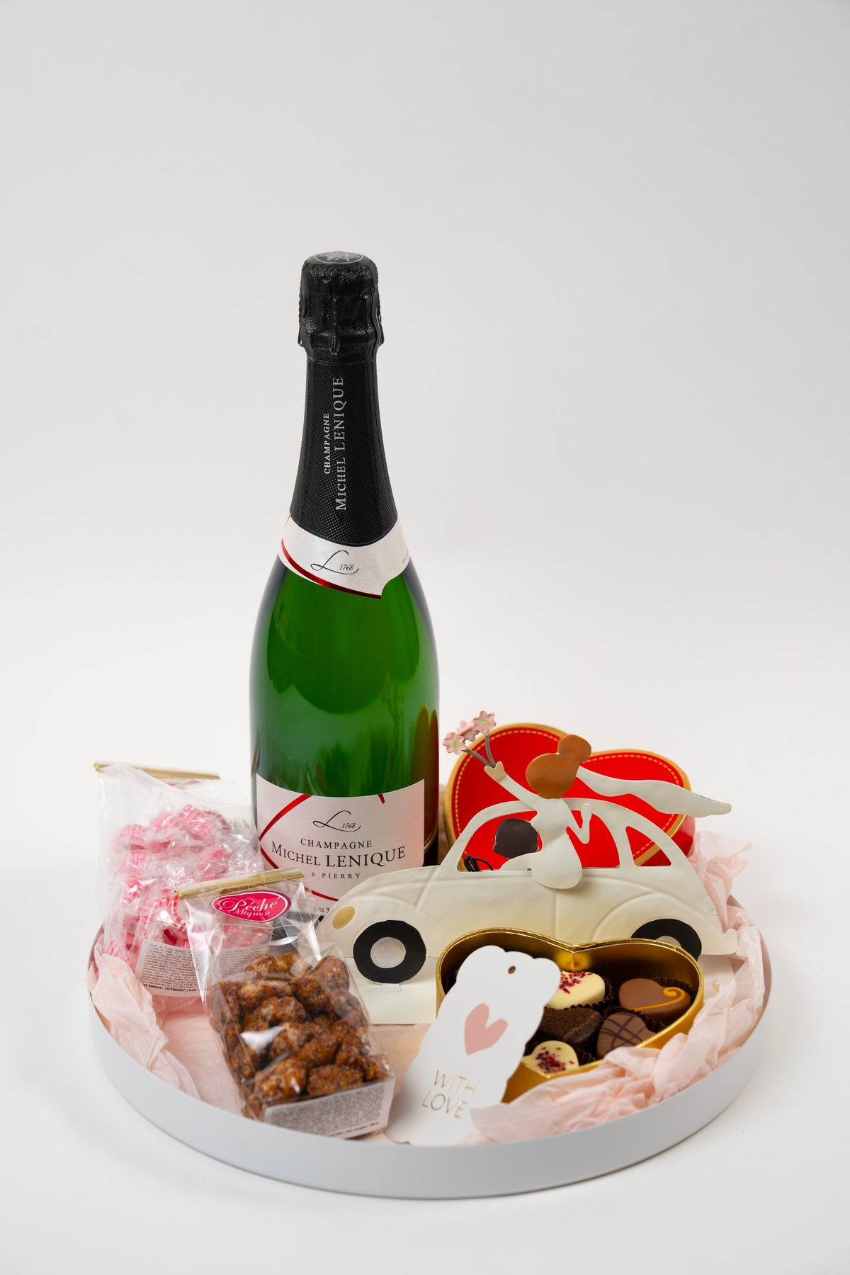 Wedding champagne gift tray with chocolates and sweets for newlyweds from Péché Mignon.