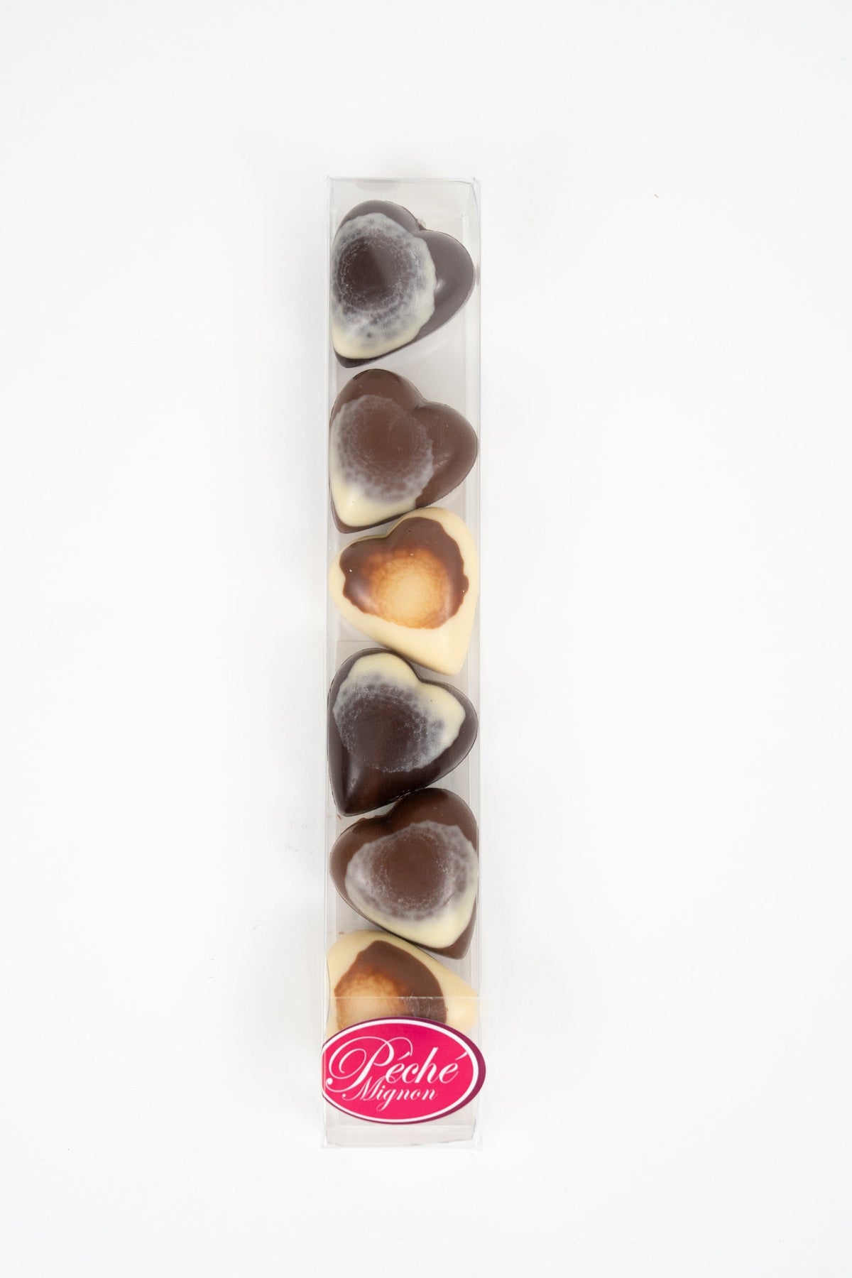 Coffret de chocolats cœurs marbrés belges fourrés pistache, vanille et caramel