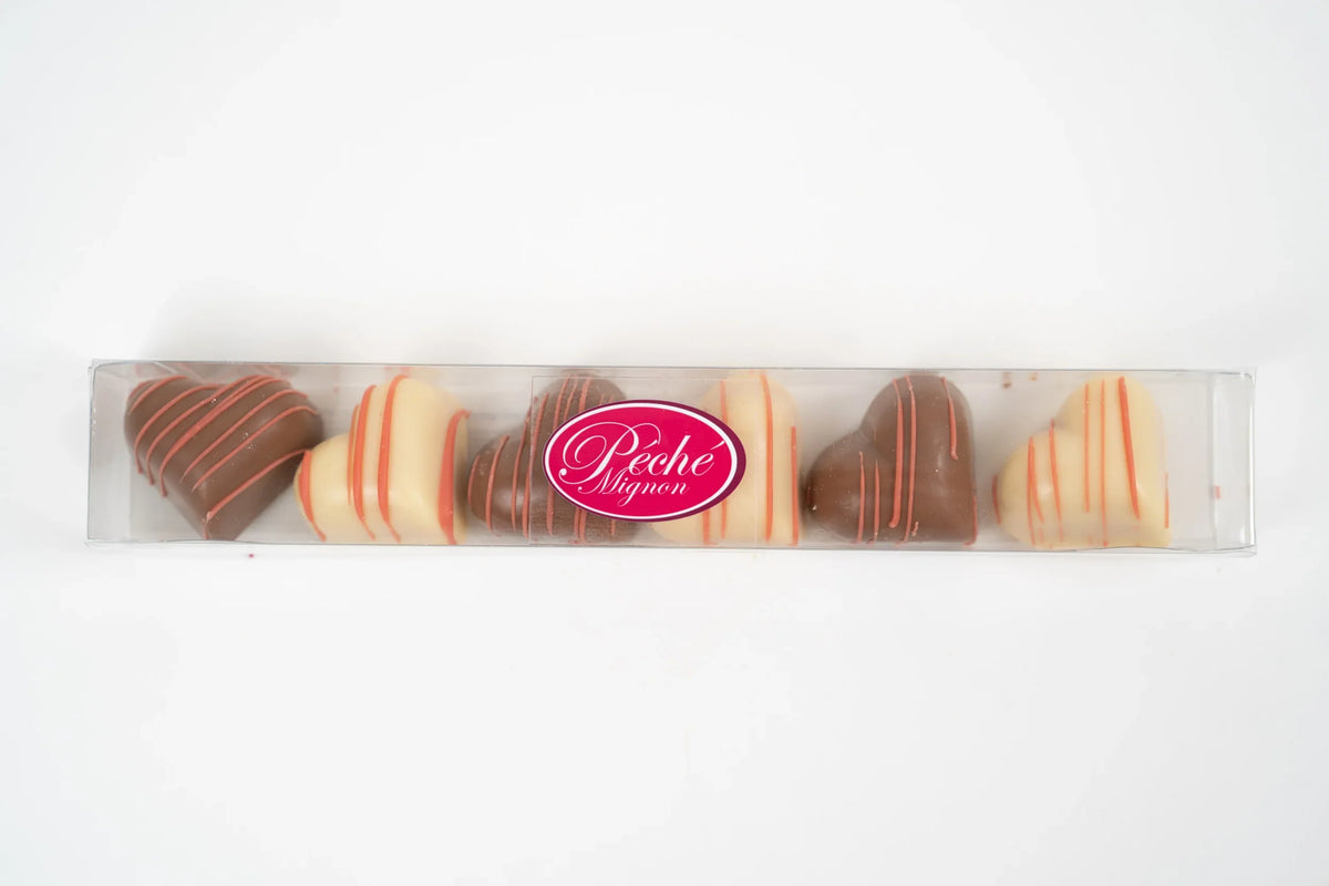 Gift box of filled milk and white chocolate hearts