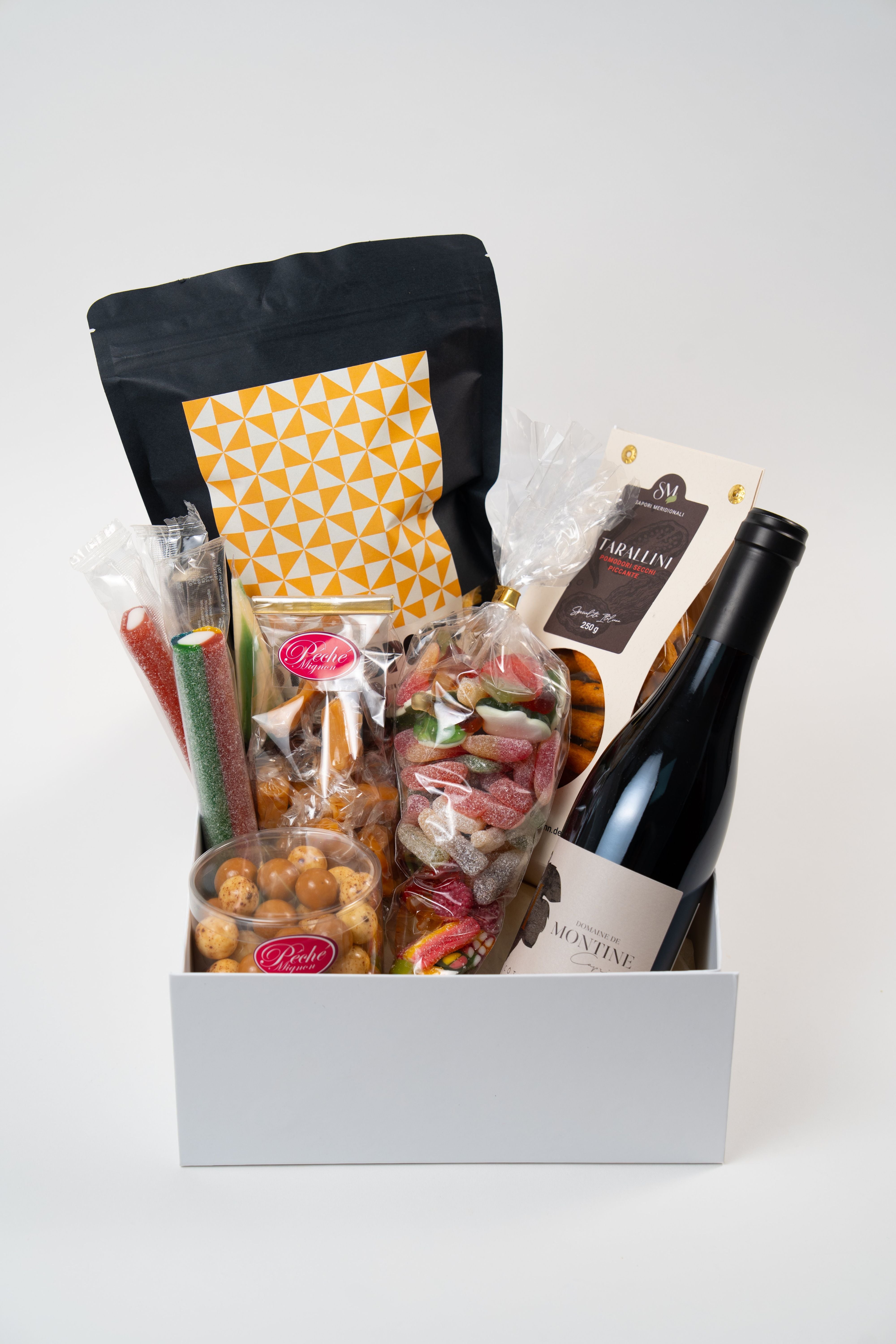 Gourmet home cinema gift box with wine, sweets, chocolate and snacks from Le Péché Mignon.