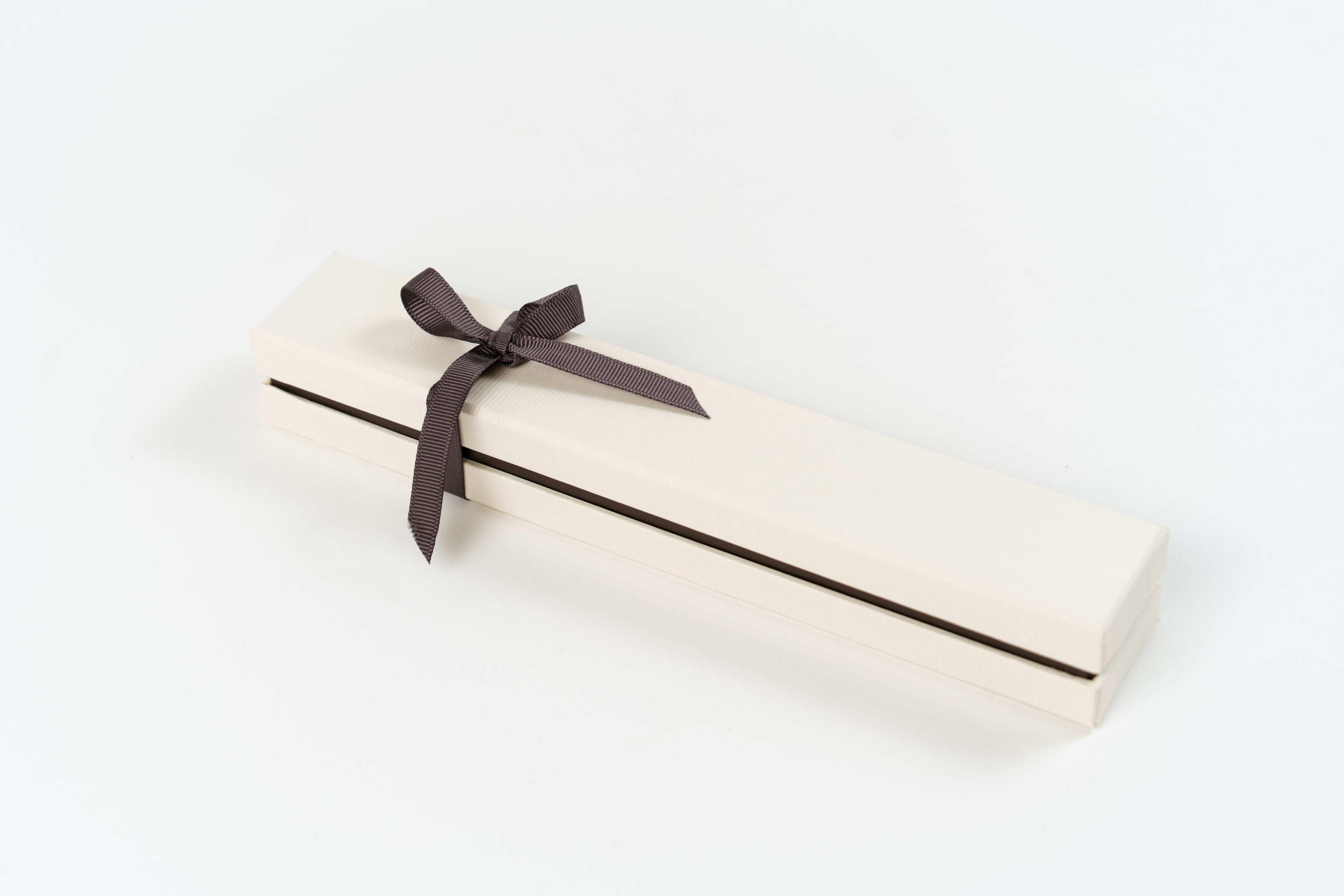 Coffret de pralines belges artisanales en boîte élégante Péché Mignon