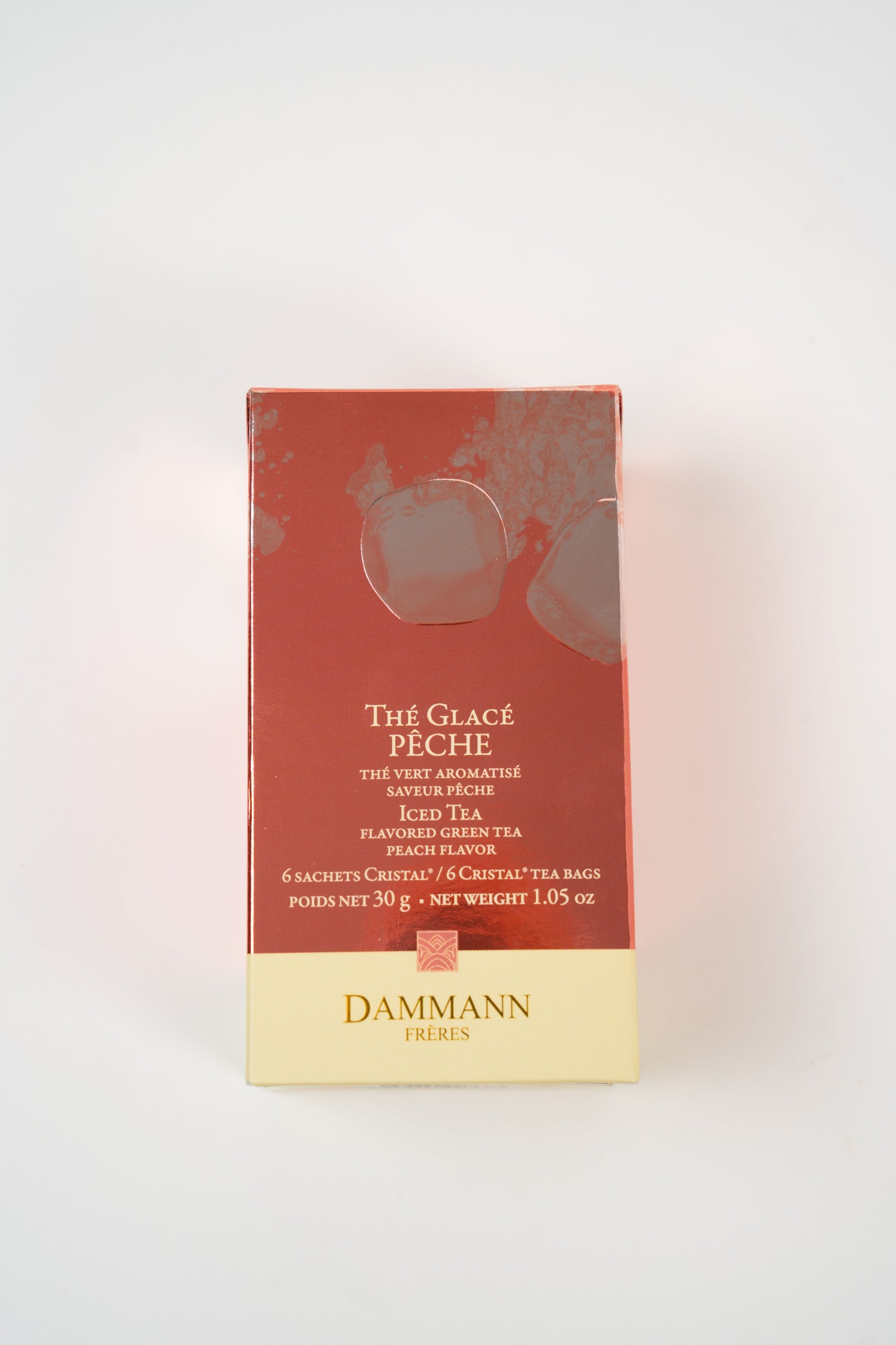 Dammann Frères Thé Glacé Pêche iced tea sachets box on a white background