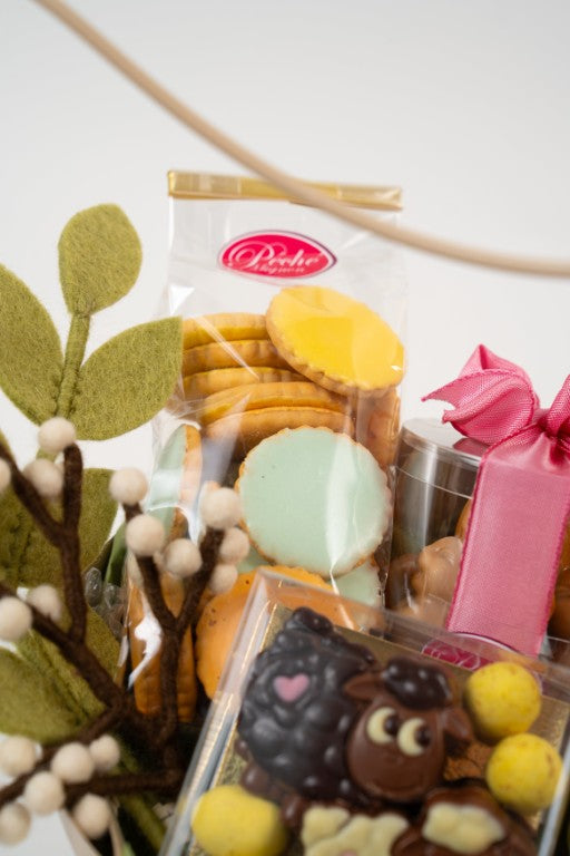 Close-up of Easter biscuits and chocolates in a gourmet assortment from Le Péché Mignon.