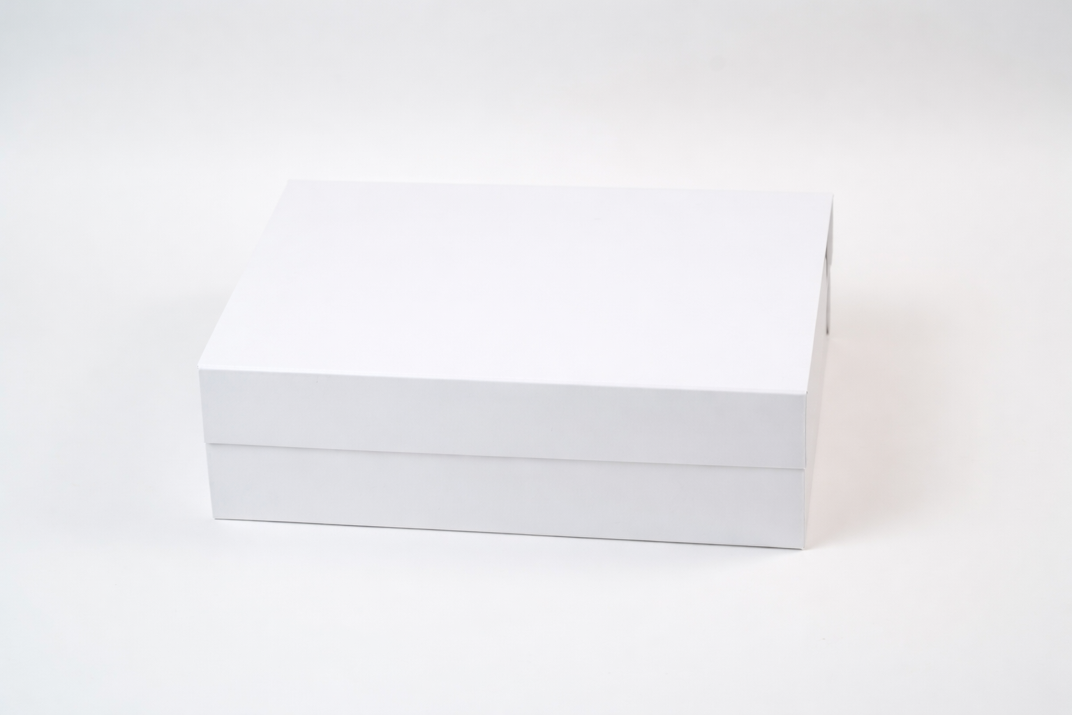 Boîte cadeau blanche premium élégante pour coffrets gourmands Péché Mignon