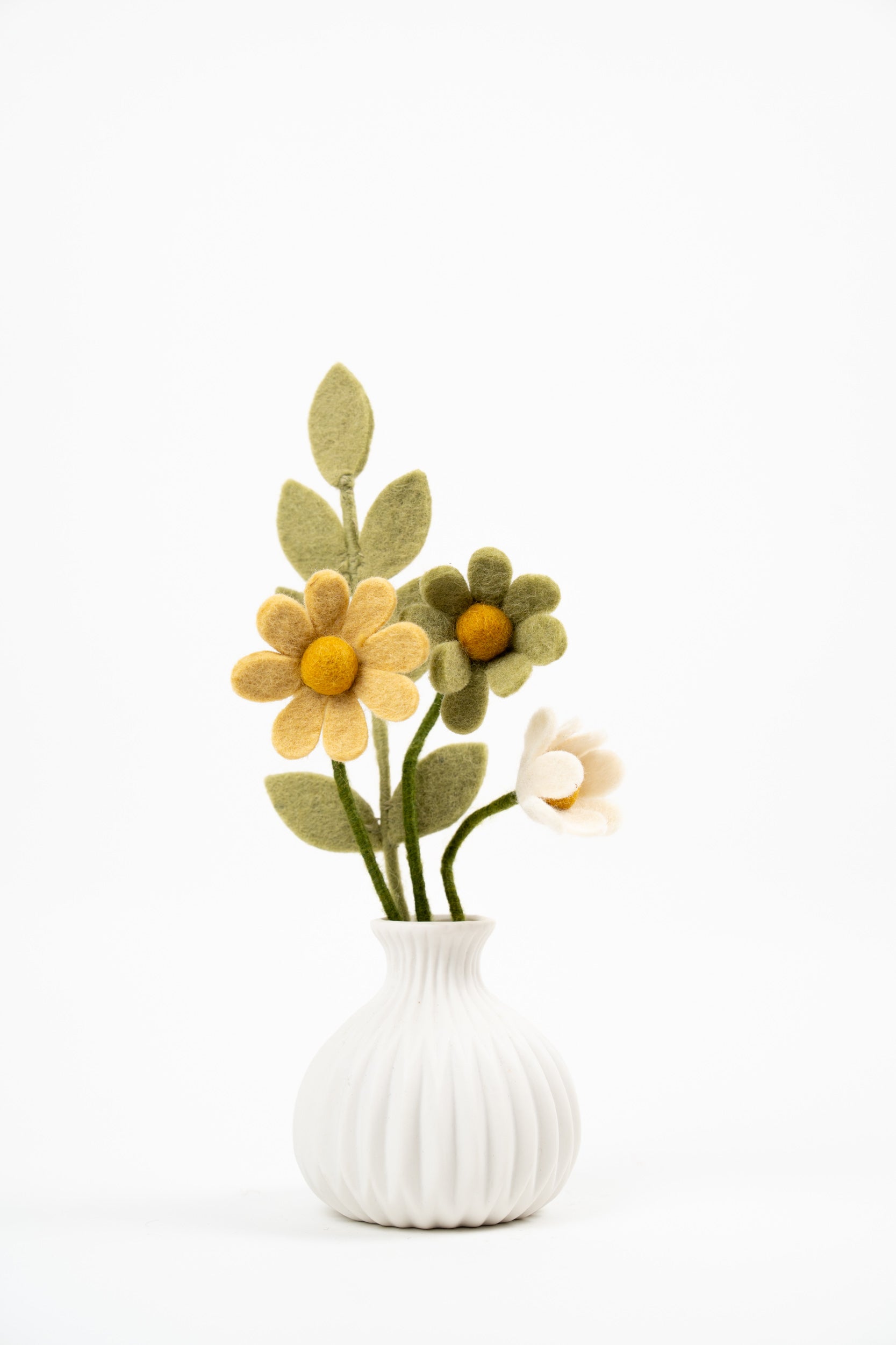 Handmade Gry & Sif felt wildflower mini bouquet with soft yellow and ivory flowers in a white vase
