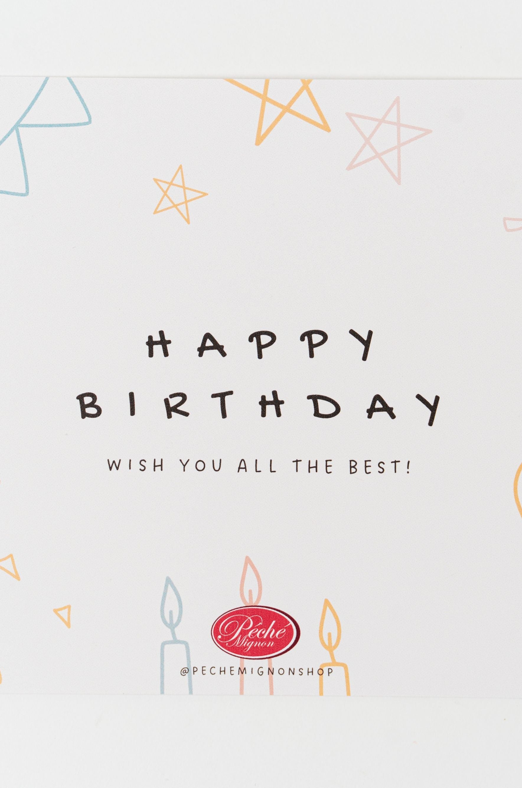 Minimal “Happy Birthday” greeting card with festive illustrations on white background