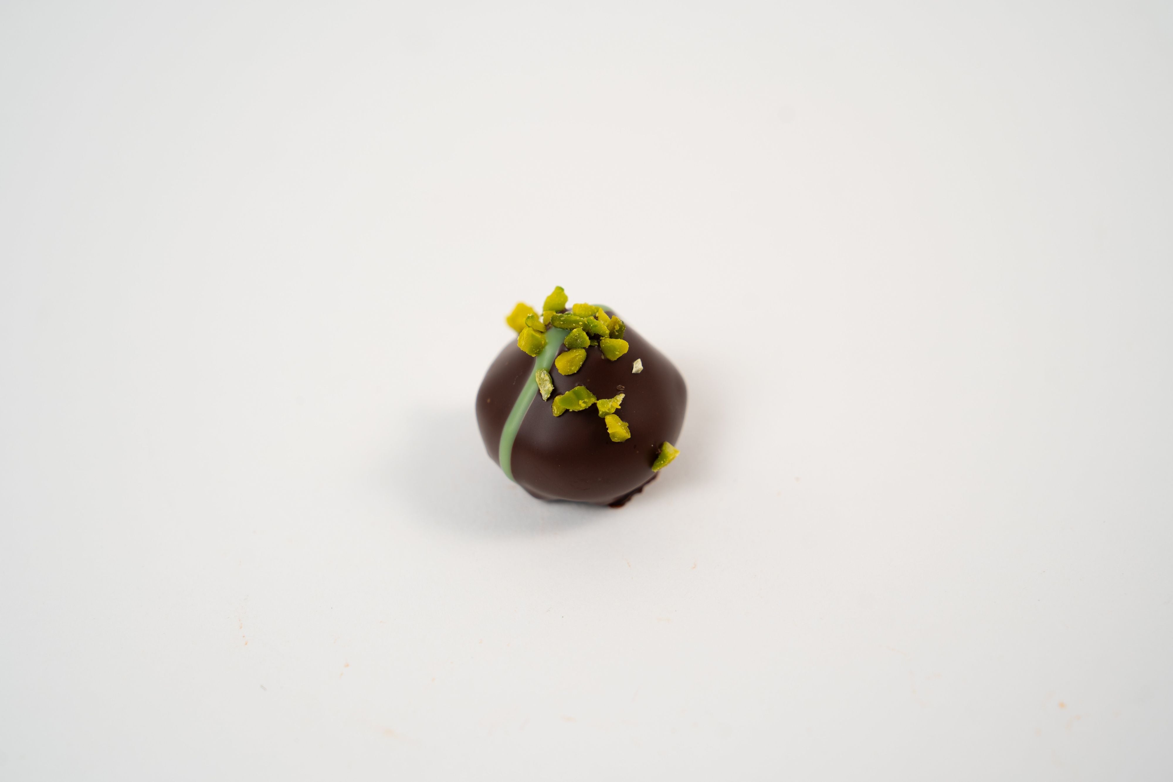 Pistachio marzipan praline with nougat filling