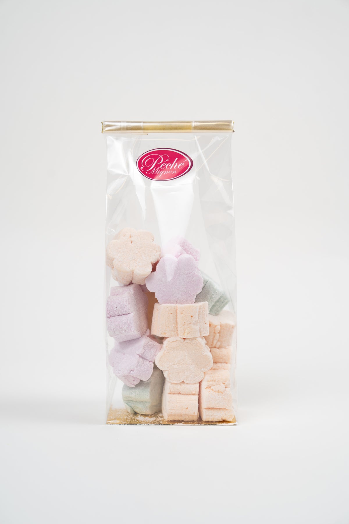 Mini flower-shaped marshmallows in a transparent bag from Péché Mignon