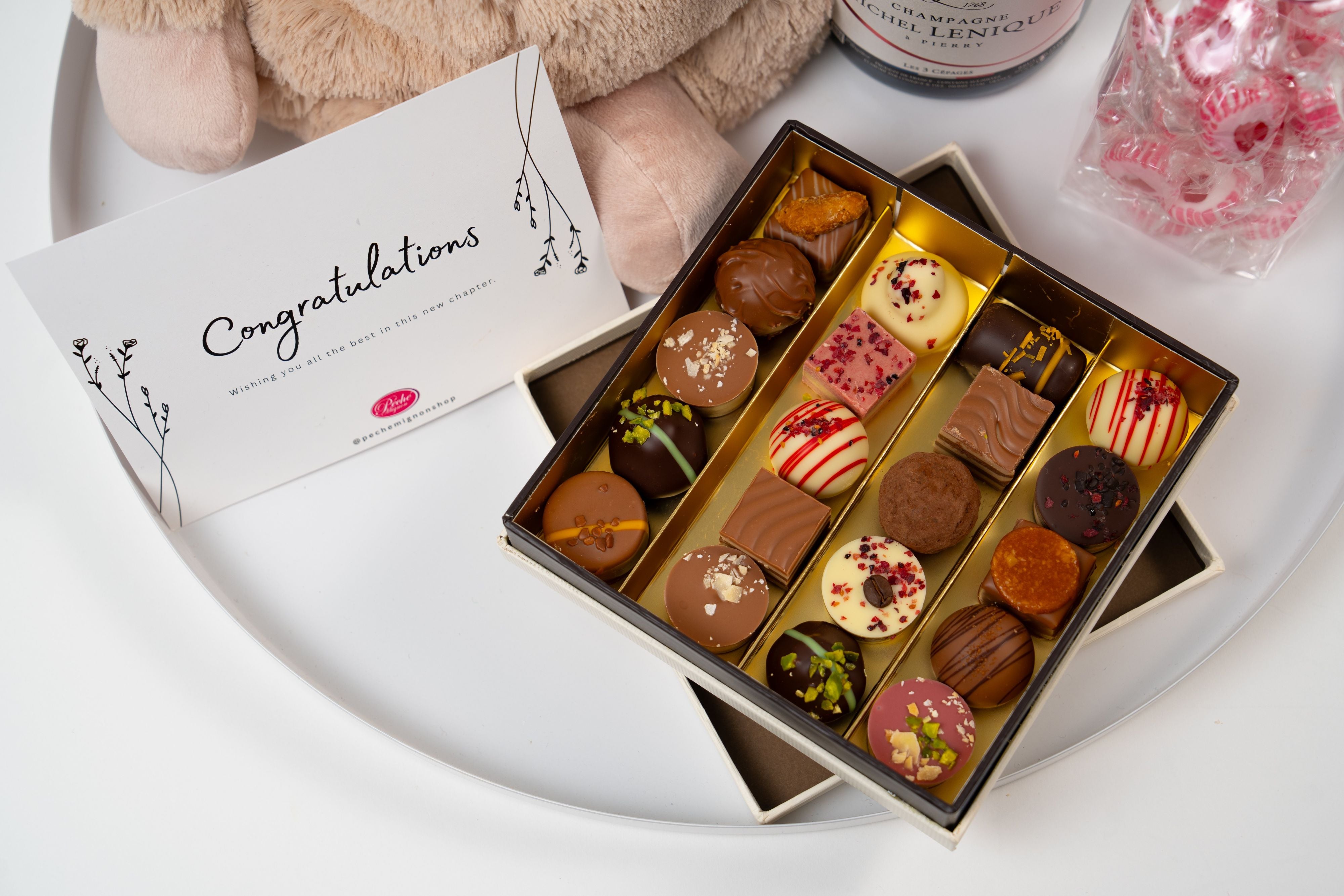 Luxury artisan chocolate box included in Péché Mignon baby celebration gift set