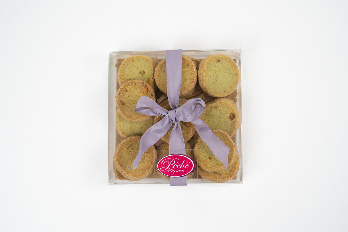 Pistachio biscuits in gift box with ribbon by Péché Mignon