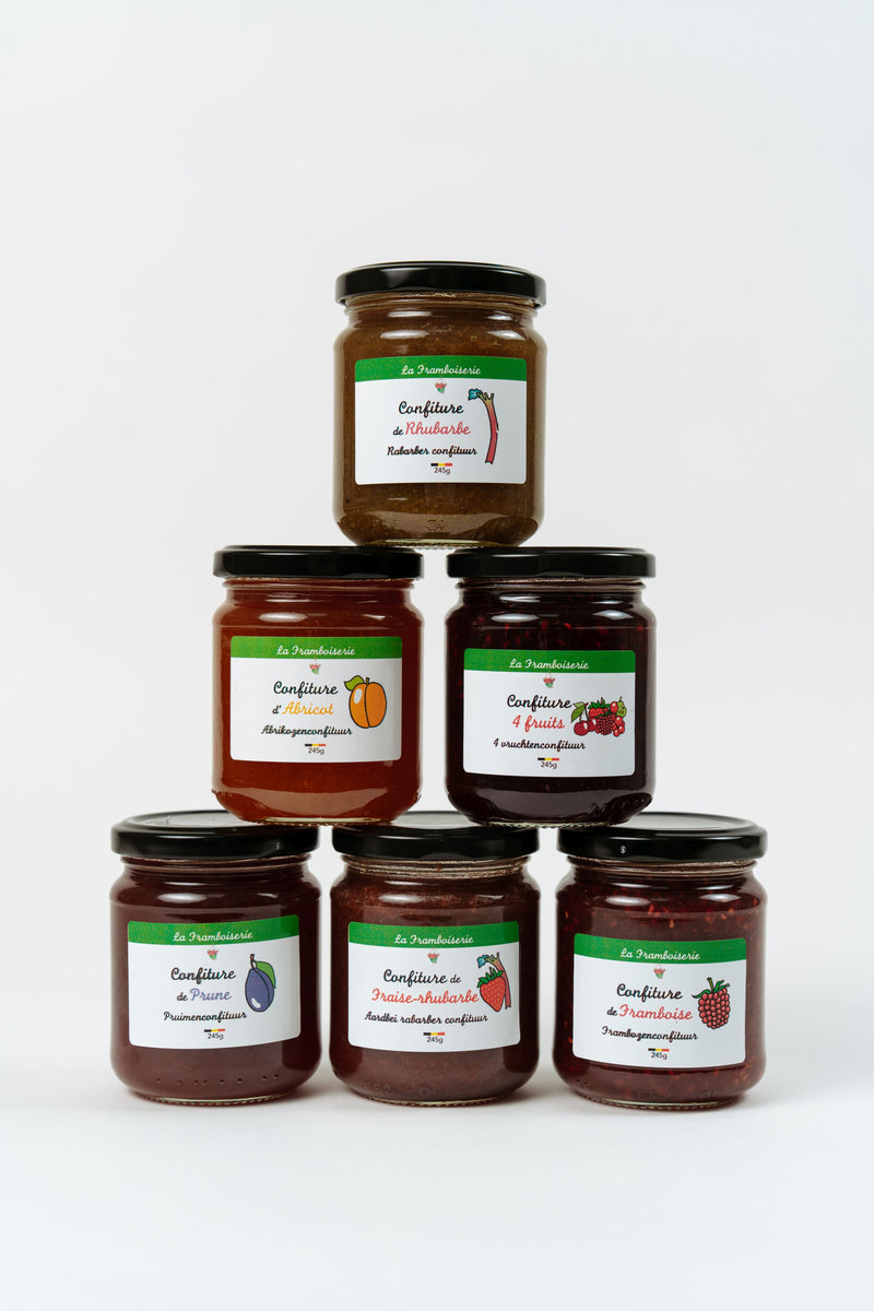 Selection of artisan Belgian fruit jams by La Framboiserie including rhubarb, apricot, four fruits, plum, strawberry rhubarb and raspberry preserves