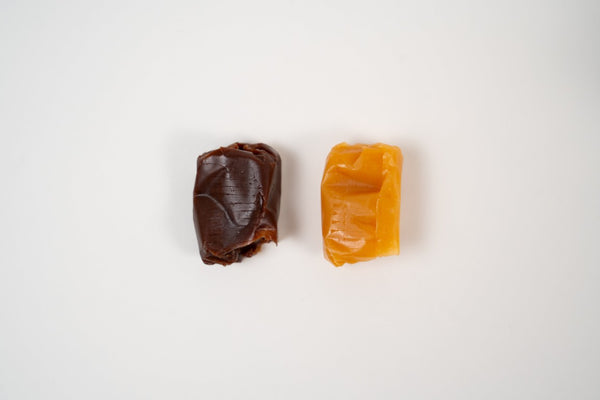 Selection of artisan soft caramels including classic caramel and vanilla caramel on a white background