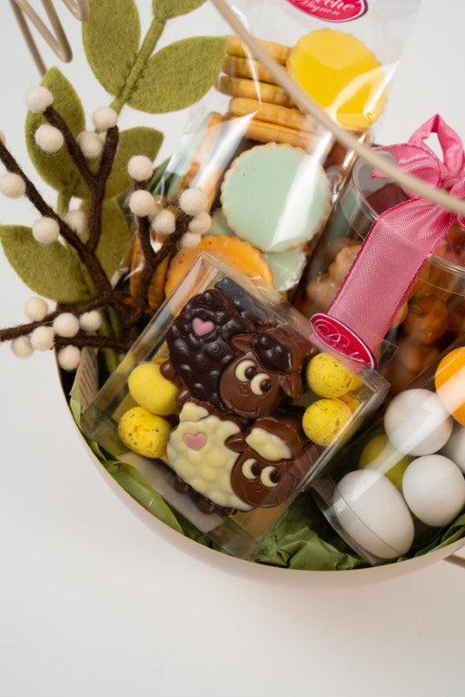 Easter chocolate and biscuit assortment with pralines and sugar eggs from Le Péché Mignon.