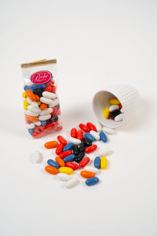 batonnets de reglisse enrobes colores dans un sachet plastique