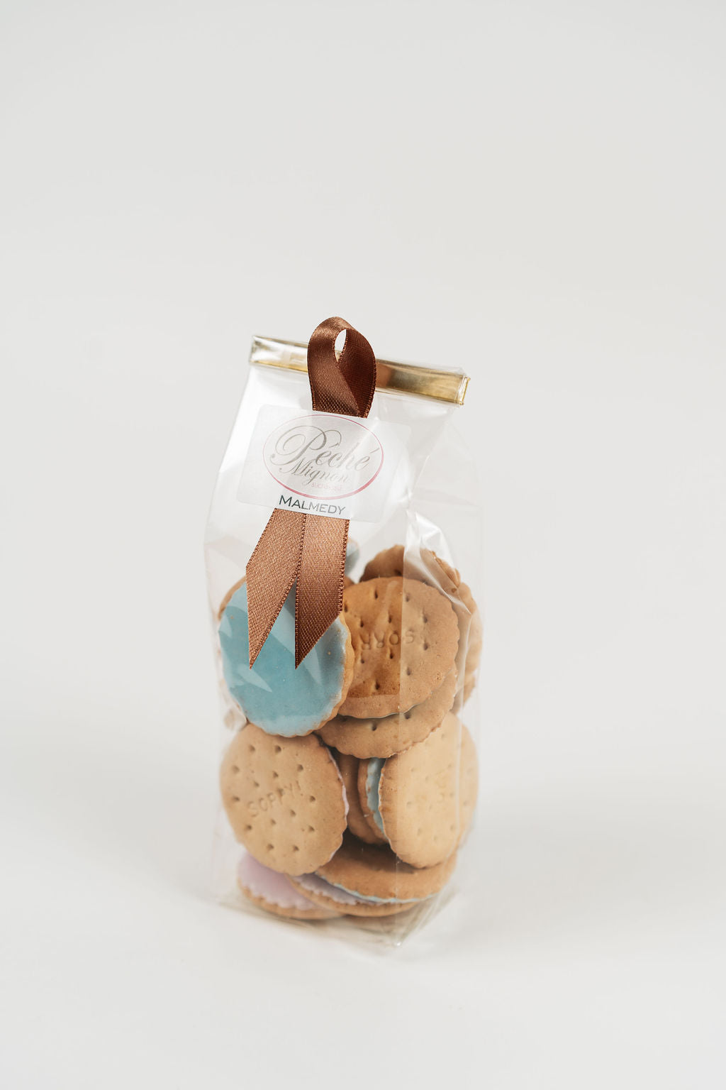 Biscuits glacés rose, blanc et bleu en sachet – Péché Mignon