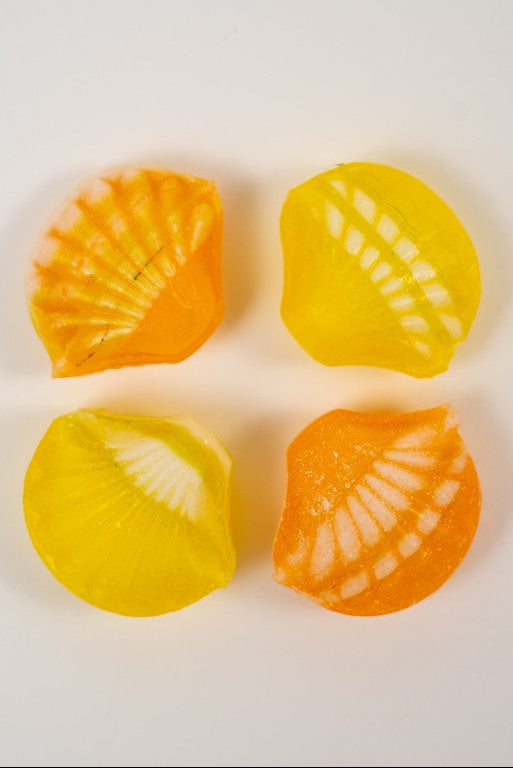 bonbons citron fourrés jaunes et orange avec cœur poudre acidulée