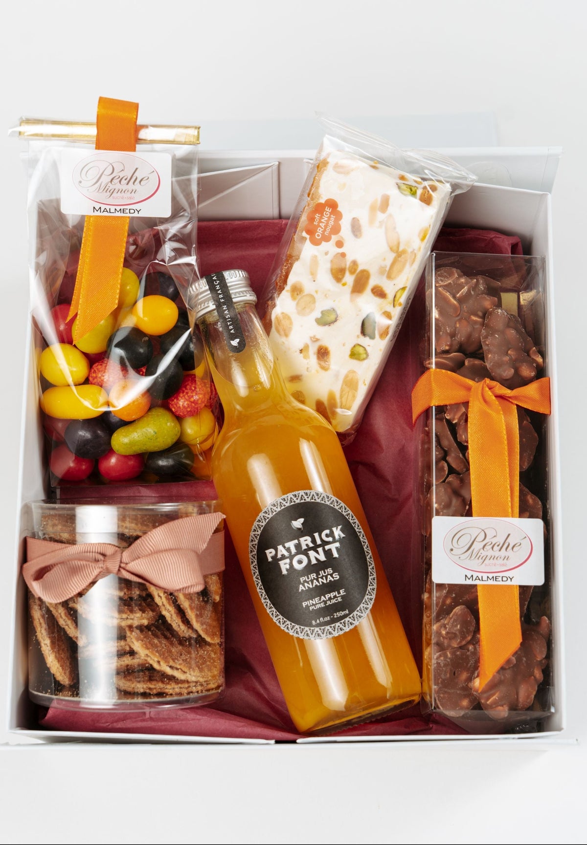 Coffret avec jus d’ananas, biscuits et chocolats artisanaux