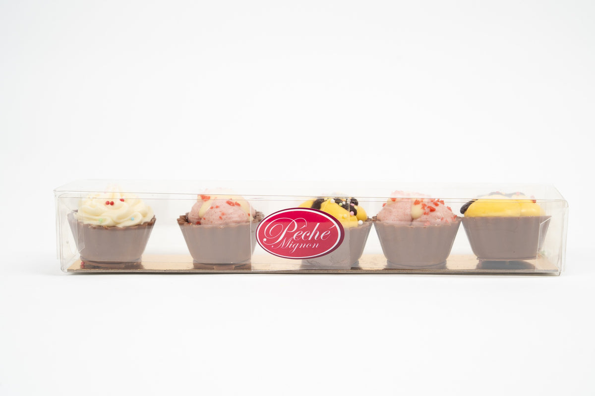 Assorted filled chocolate cupcakes with strawberry, banana and almond flavours in transparent gift box