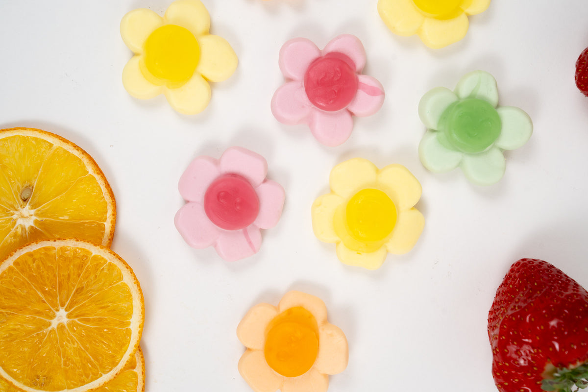 Fruit flavoured flower shaped jellies with orange and strawberry