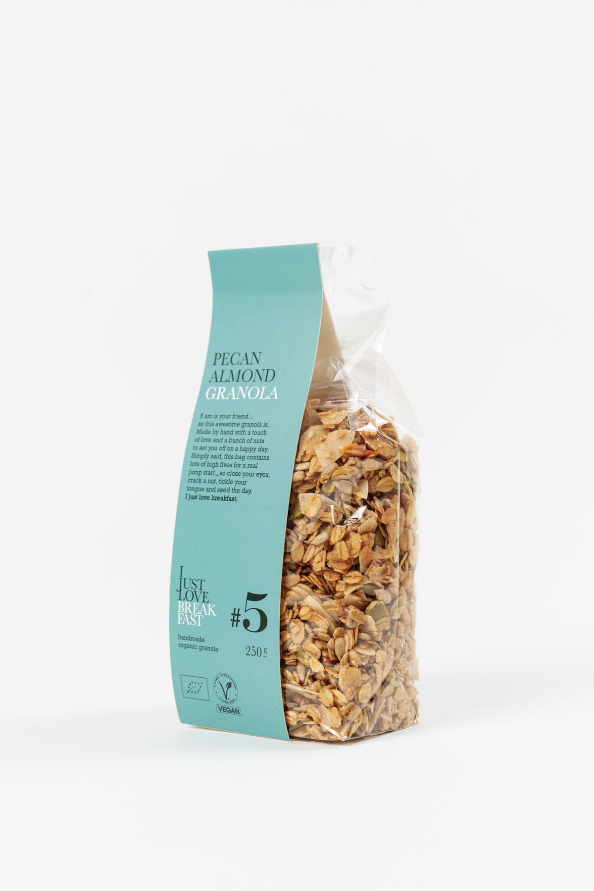 Granola bio noix de pécan et amandes Péché Mignon en sachet transparent 250g
