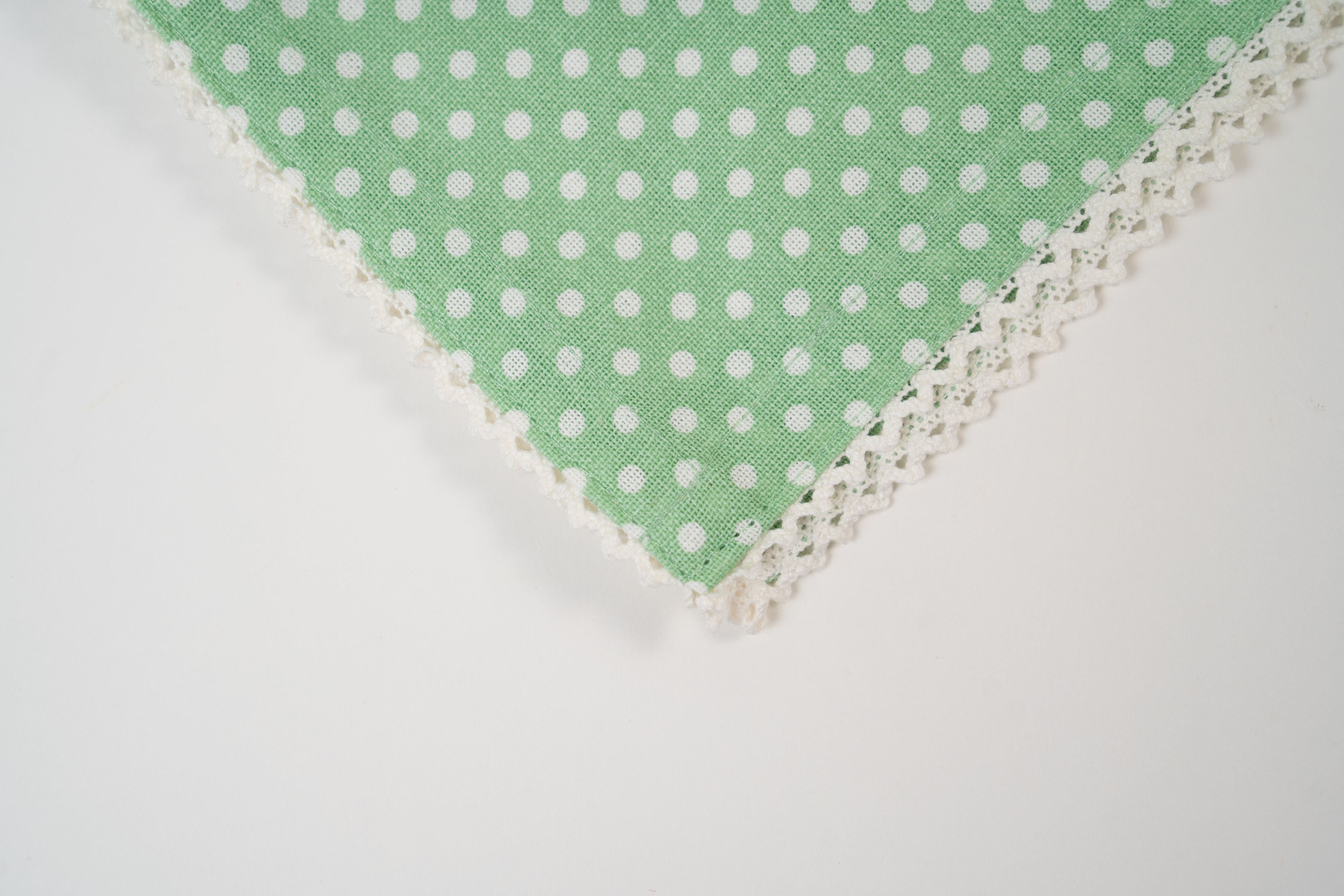 Green polka dot napkin with lace trim used in Breakfast Bliss gift box