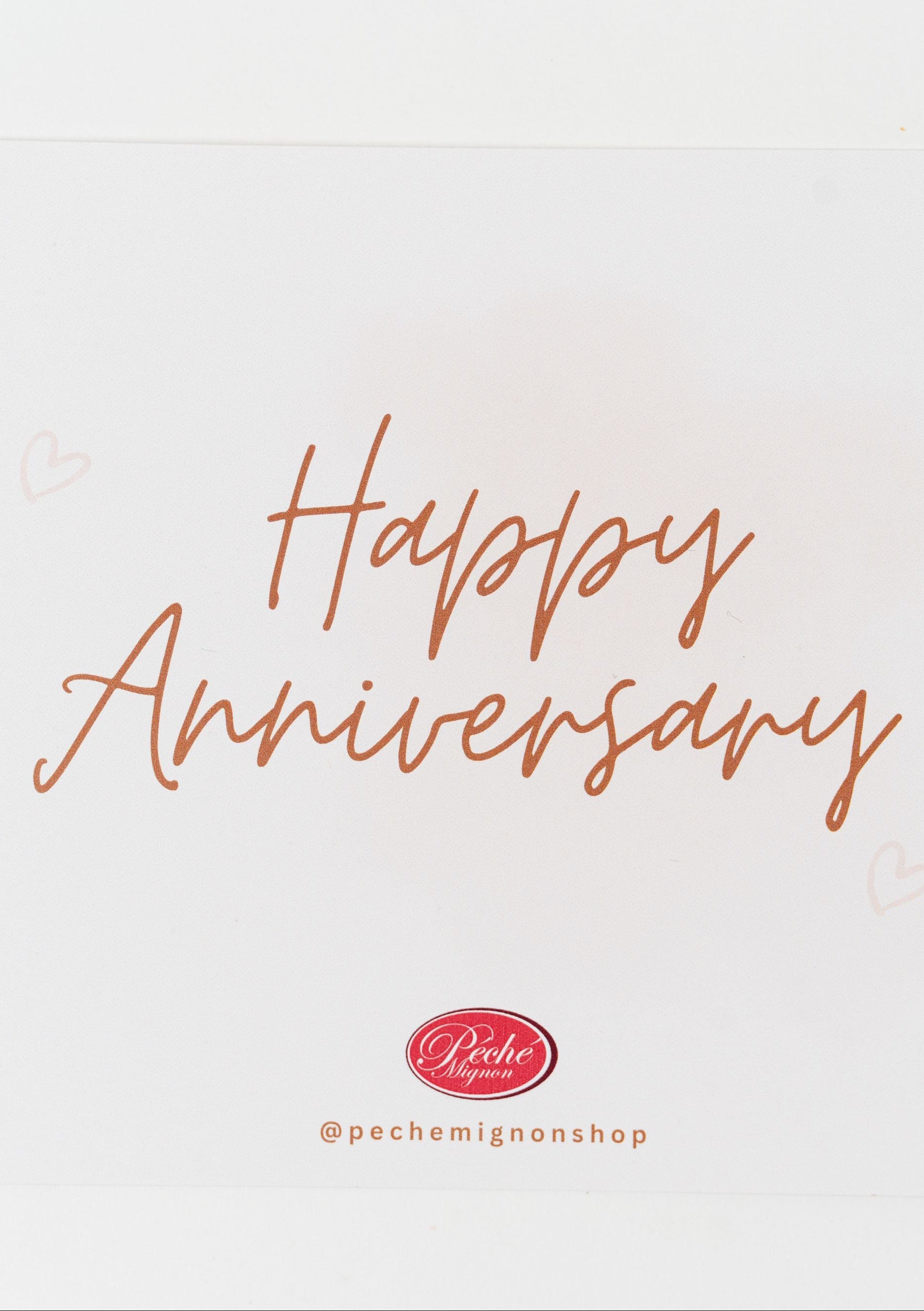Elegant “Happy Anniversary” greeting card with minimalist design on white background