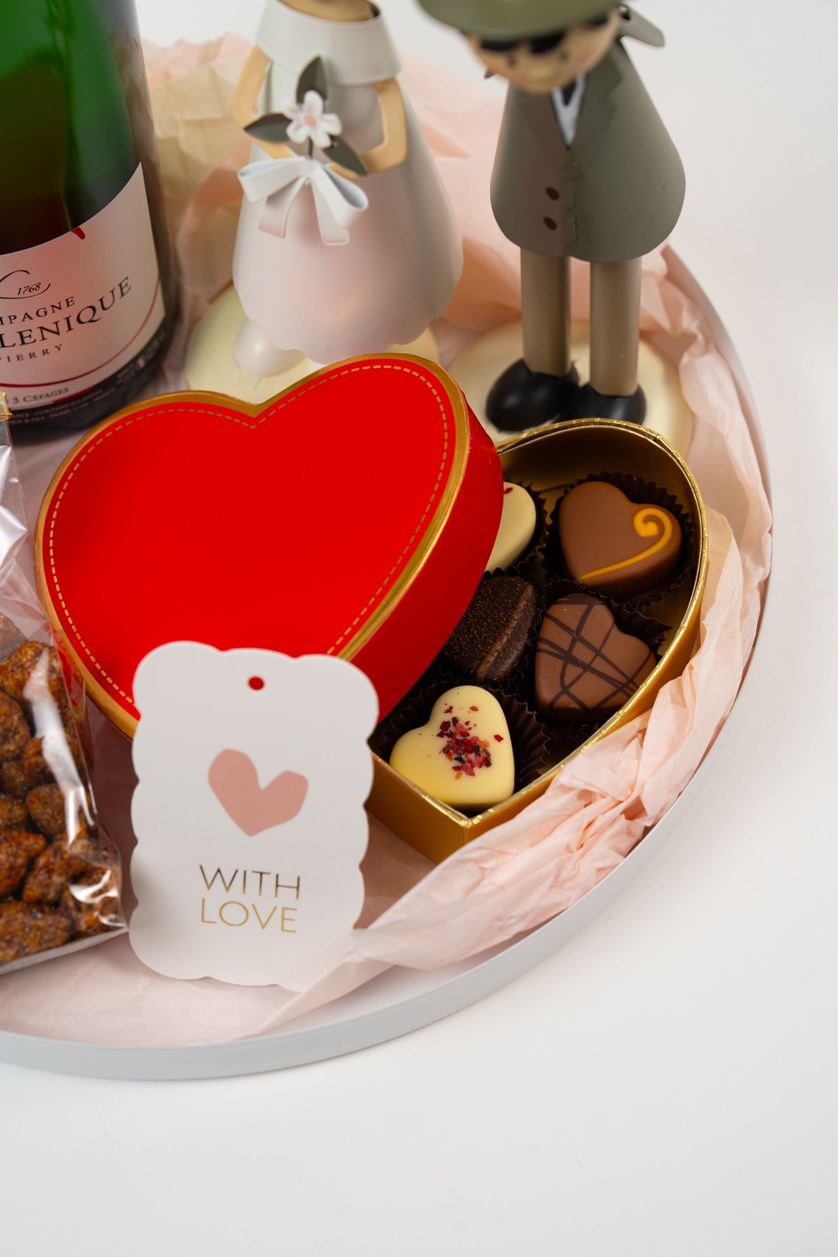 Heart shaped chocolate pralines in a romantic wedding gift box from Péché Mignon.