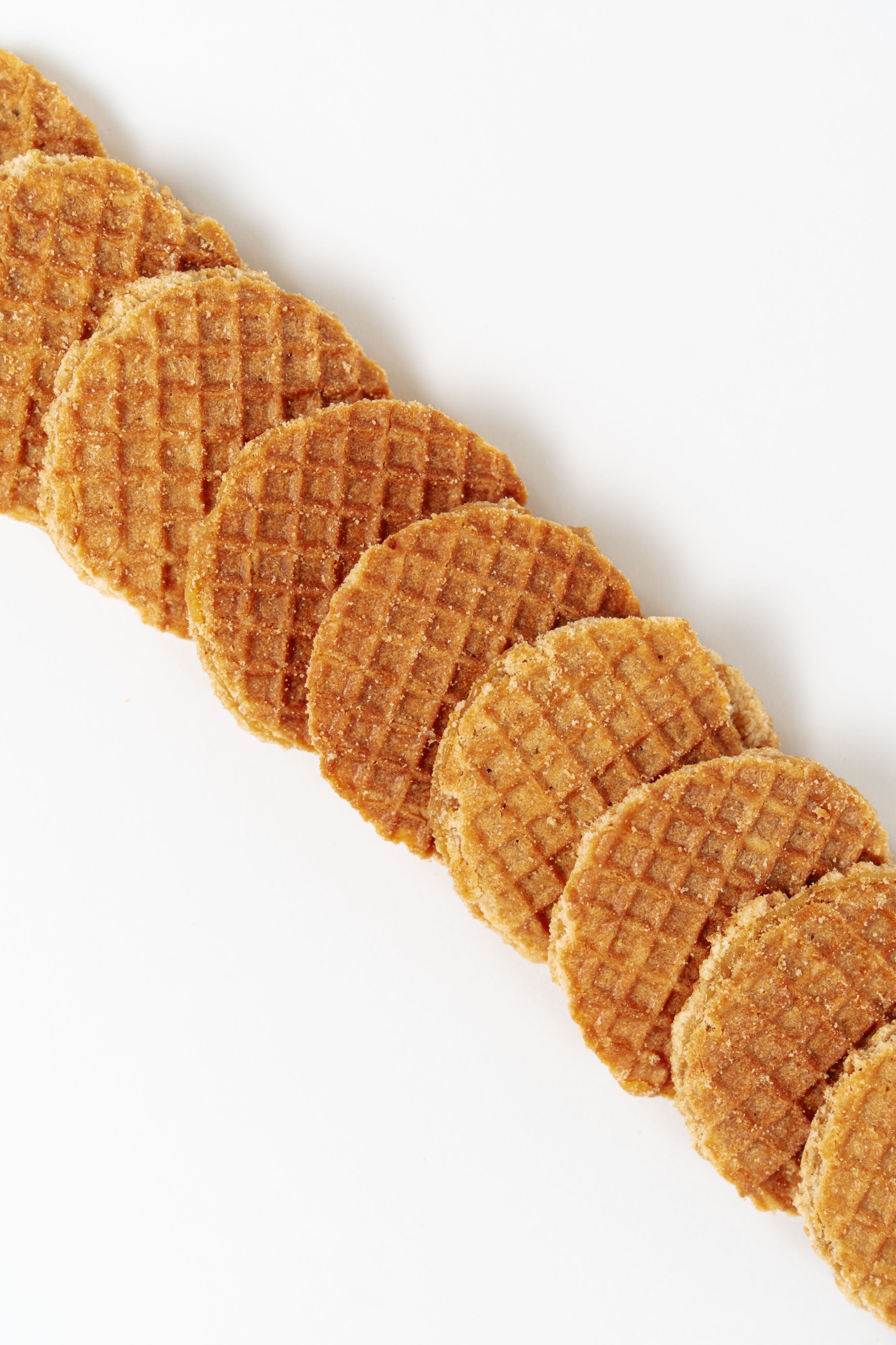 Mini gaufres à la mélasse alignées texture dorée Péché Mignon