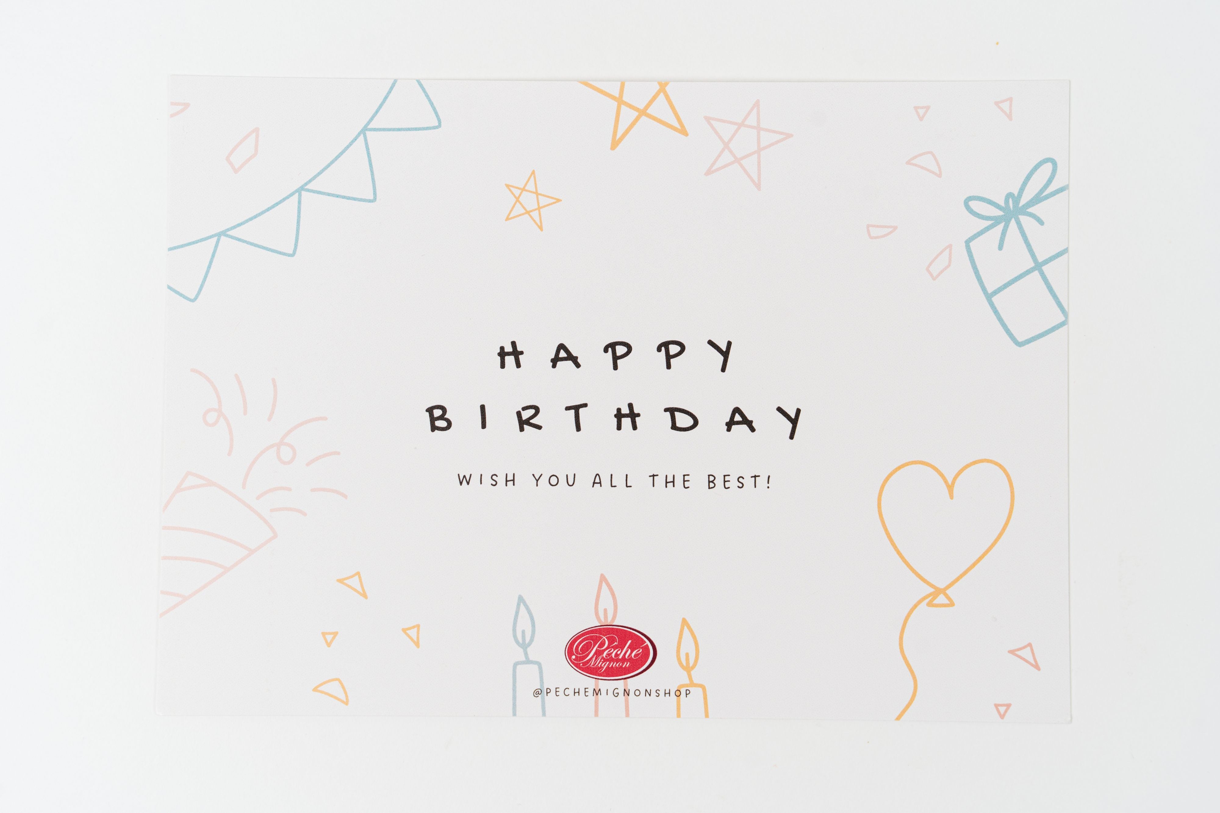 Minimal birthday greeting card with pastel celebration illustrations, “Happy Birthday” text and Péché Mignon branding on a white background.