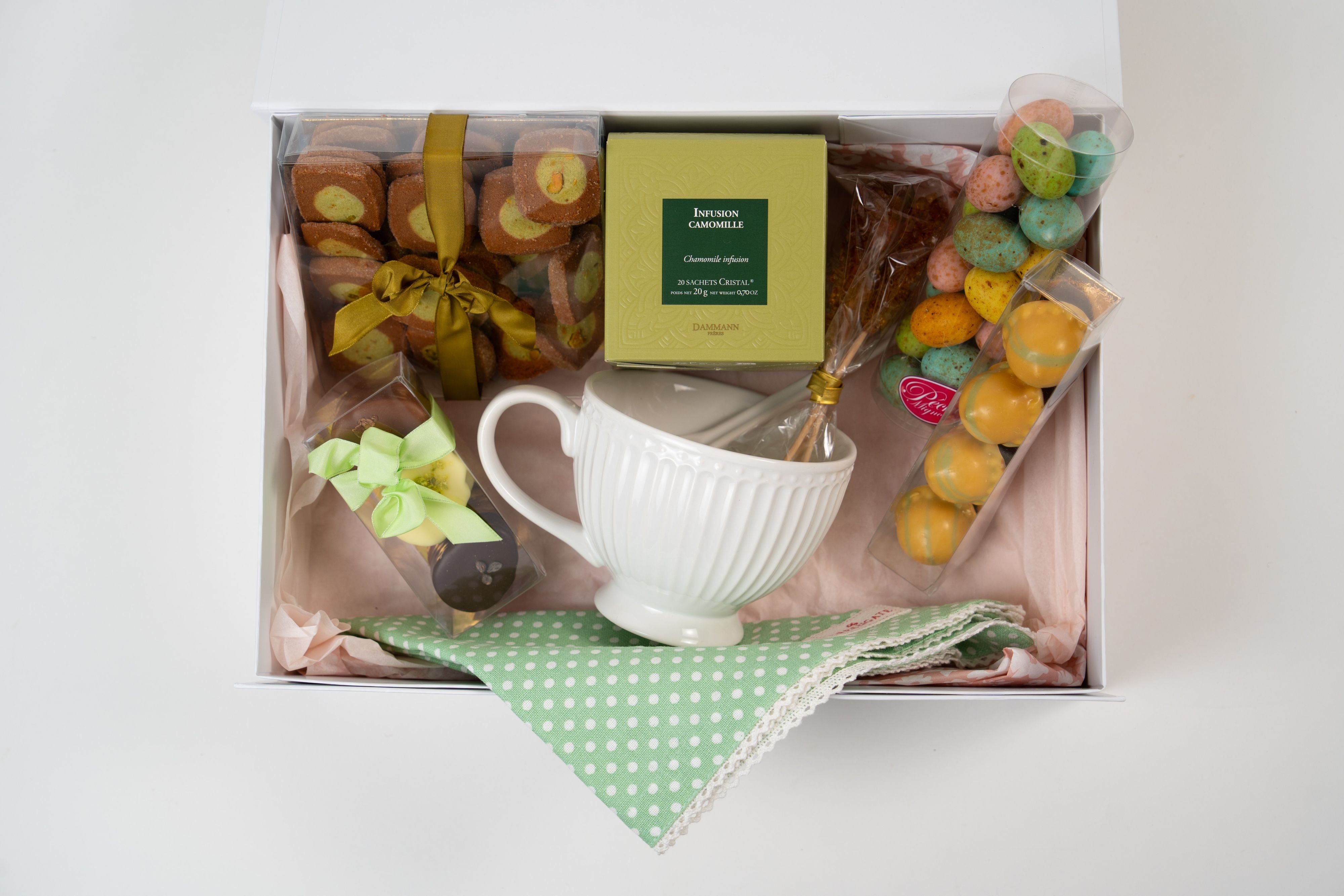 Spring tea gift box with chocolates, biscuits, chamomile infusion and teacup from Péché Mignon