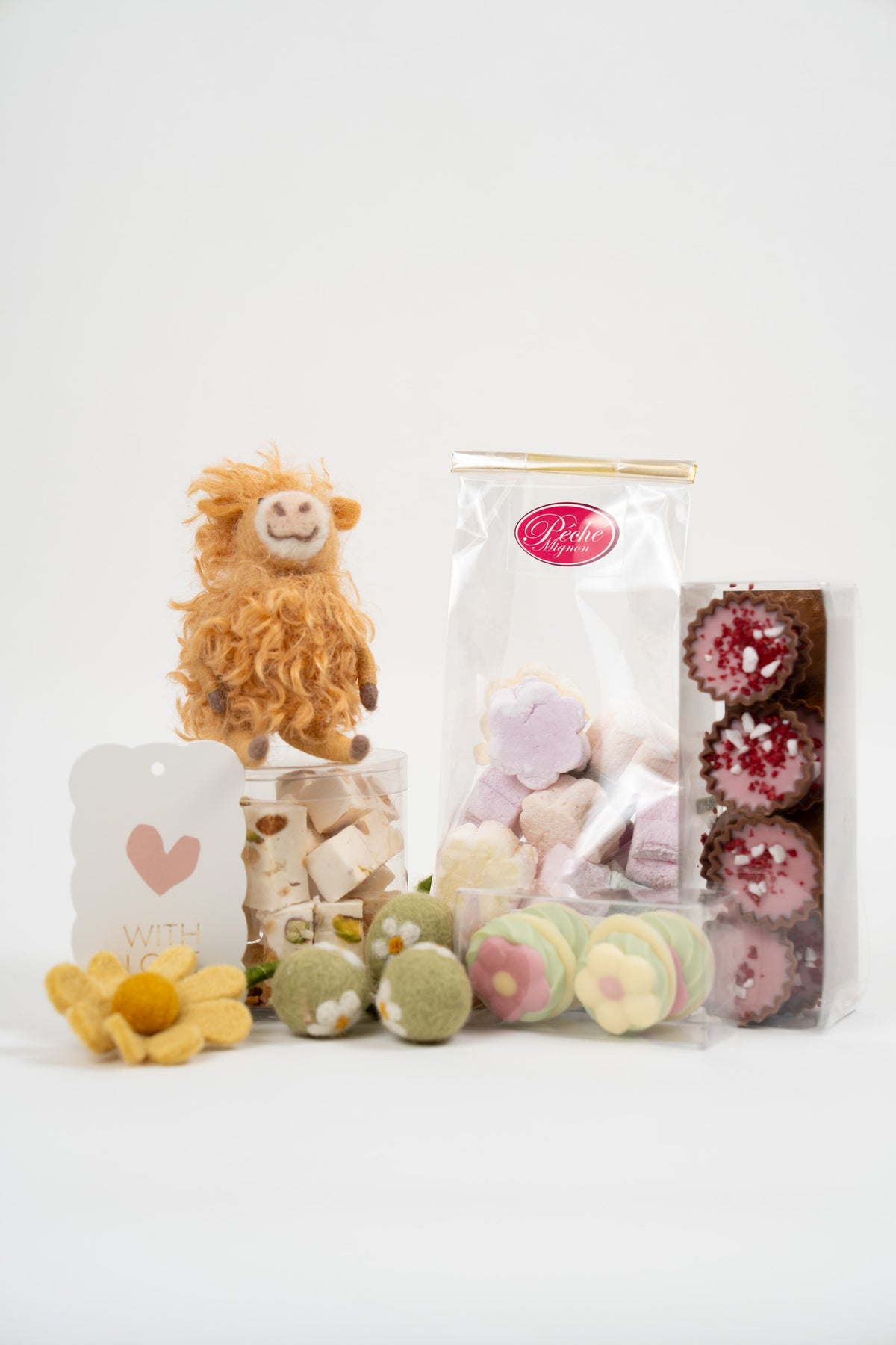 Péché Mignon artisan spring sweets selection with marshmallows, nougat, chocolate cups, flower chocolates and decorative seasonal treats