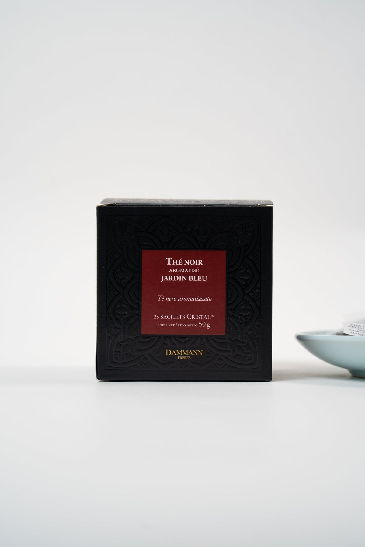 Thé noir Jardin Bleu Dammann Frères avec sachets Cristal® et tasse de thé infusé
